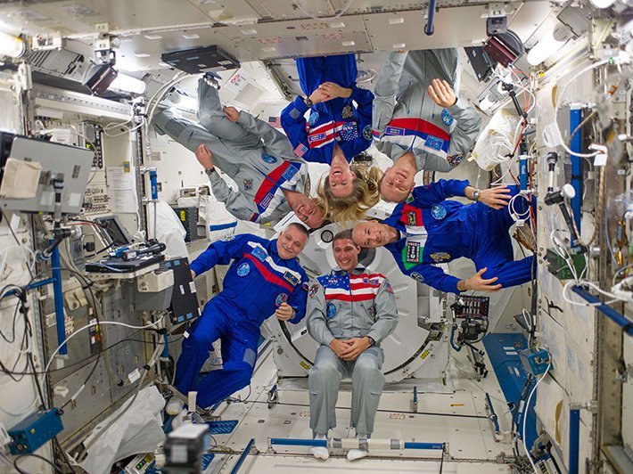Crew portrait in the Kibo laboratory of the International Space Station.