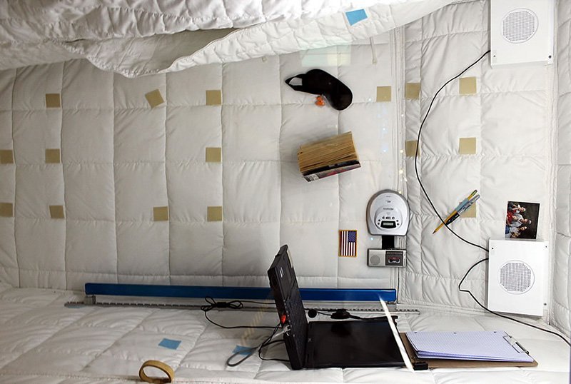 An astronaut's sleeping quarters aboard the International Space Station.